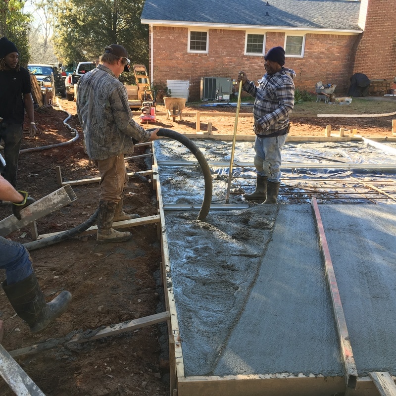 pouring concrete slab steel garage